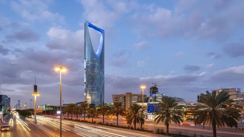 Panoramic view of Riyadh city skyline with Kingdom Tower at sunset
