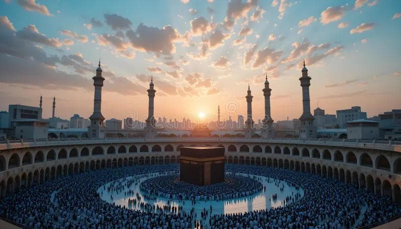 View of the Holy Kaaba in Masjid al-Haram with pilgrims surrounding it during sunset